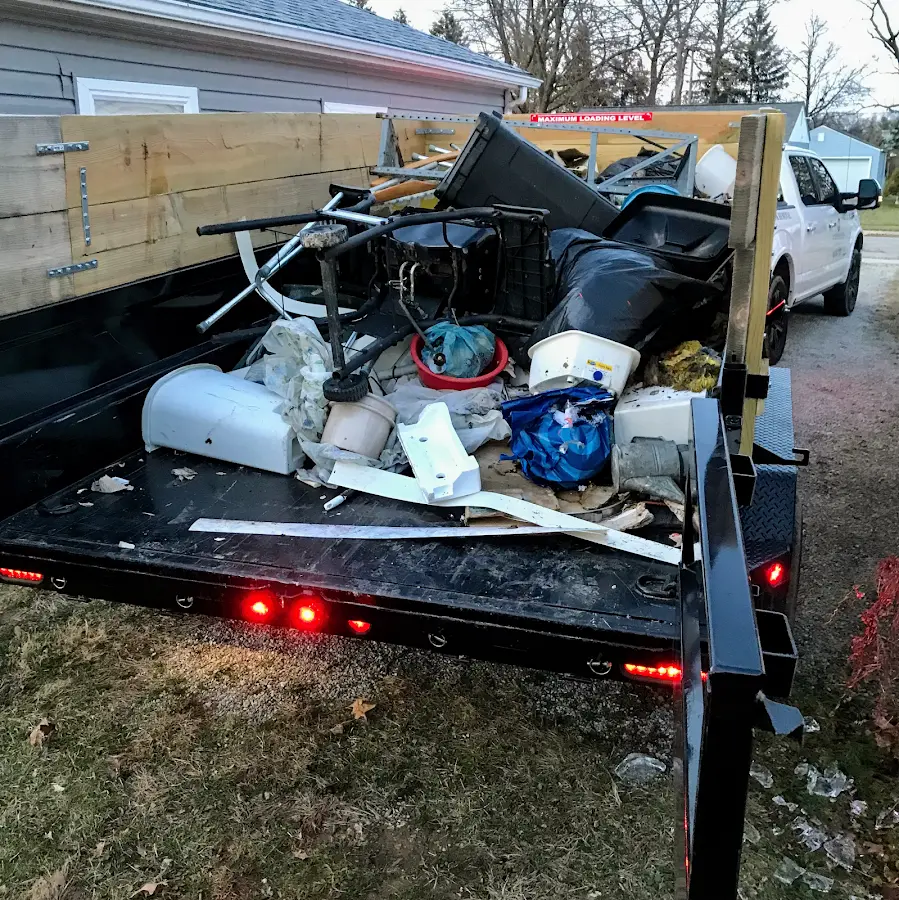 Roll-off dumpster delivered to a residential driveway in Perinton